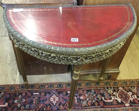 Brass decorated demi lune table